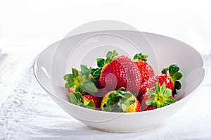 Fresh strawberries on white