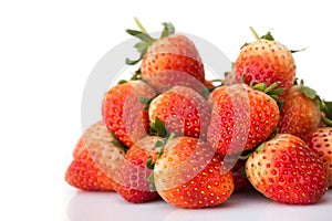 Fresh strawberries on white background. With copy space.