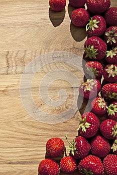 Fresh strawberries on wooden table