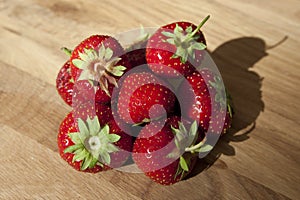 Fresh strawberries on wooden table