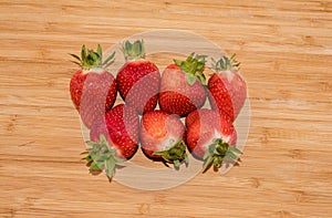 Fresh strawberries on the wooden table