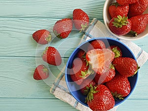 fresh strawberry sweet dish delicious towel on a blue wooden background