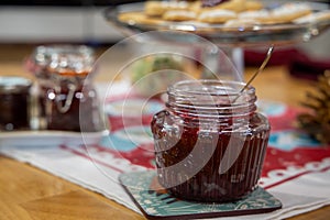 Fresh strawberry jam in glass bottle