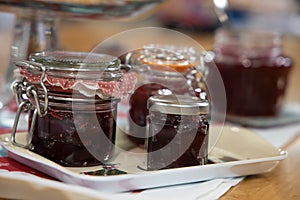 Fresh strawberry jam in glass bottle