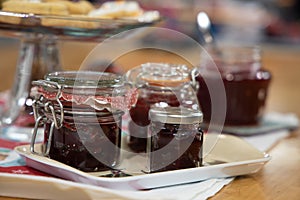 Fresh strawberry jam in glass bottle