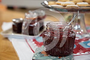 Fresh strawberry jam in glass bottle