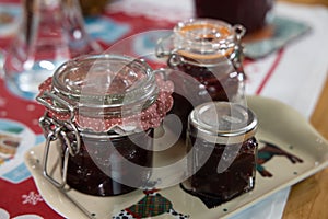 Fresh strawberry jam in glass bottle