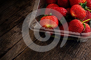 Fresh strawberry in plastic box packaging