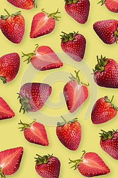Fresh strawberry on a yellow background