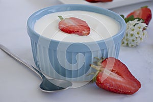 Fresh strawberry yogurt snack calcium freshness   a light background rustic