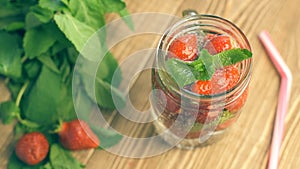 Fresh summer drink with strawberry and mint