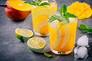 Fresh summer mango lemonade with lime and mint