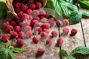 Fresh summer rasberry on wooden background