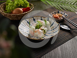 Fresh Summer Roll Vegetarian vietnamese spring rolls chopsticks and soy sauce, healthy vegan snack, asian food