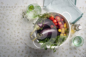 Fresh summer vegetables in a colander