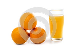 Fresh sunkist orange with a glass of orange juice photo
