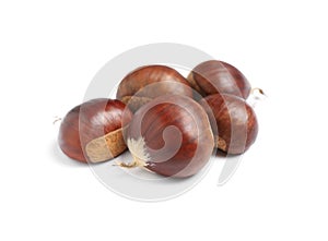 Fresh sweet edible chestnuts on white background