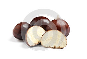 Fresh sweet edible chestnuts on white background