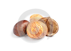 Fresh sweet edible chestnuts on white background