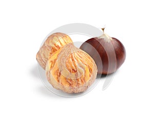 Fresh sweet edible chestnuts on white background