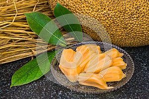 Fresh sweet jackfruit slices on a glass plate ready for eat.