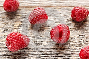 Fresh and sweet raspberries background. Selective focus