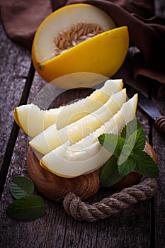 Fresh sweet sliced melon with mint