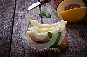 Fresh sweet sliced melon with mint