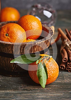 Fresh tangerines clementine with green leaves