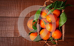 Fresh tangerines in old box