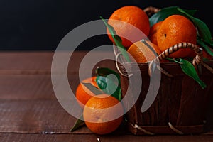 Fresh tangerines in old box