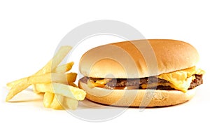 A fresh tasty cheeseburger or burger with fries stack isolated on a white background. fast food