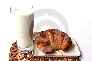 Fresh and tasty croissant and milk