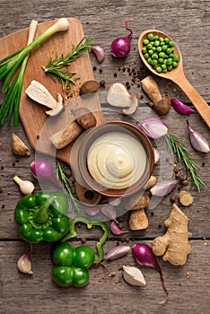 Fresh tasty ingredients for healthy cooking or salad with mayonnaise, paprika and mushrooms