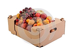 Fresh and tasty organic fruits in cardboard box, isolated on white