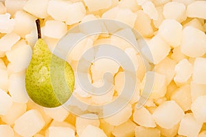 Fresh texture of frozen frozen pear pieces. Top view, flat lay, copy space