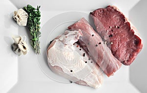 Fresh three types of meat on plate