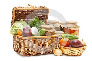 Fresh,tinned vegetables in a wattled box photo