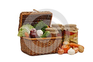 Fresh,tinned vegetables in a wattled box photo