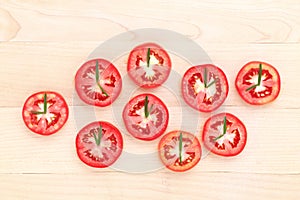 Fresh tomato cut half with rosemary leaf as a clock. World clock