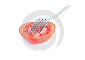 Fresh tomato on the fork