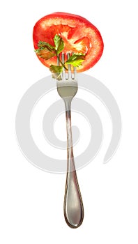 Fresh tomato slice on the fork