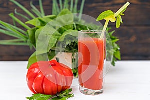 Fresh tomato smoothie or juice in a tall glass