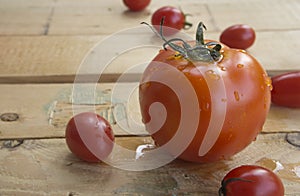 Fresh tomato on wooden