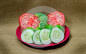 Fresh Tomatoes, Broccoli, Green Peppers and Sliced Cucumbers