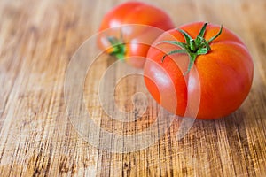 Fresh tomatoes on a cutting board