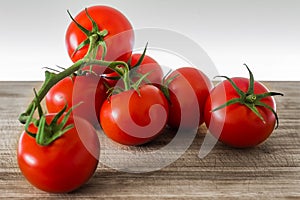 Fresh tomatoes on a cutting board