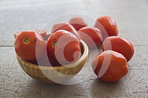 Fresh tomatoes on grey background