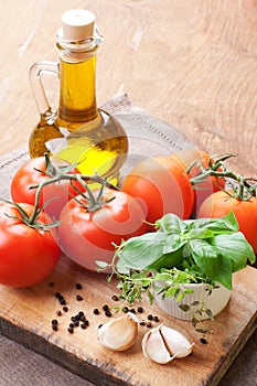 Fresh tomatoes, olive and herbs. life