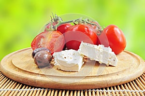 Fresh tomatoes, olives and white cheese